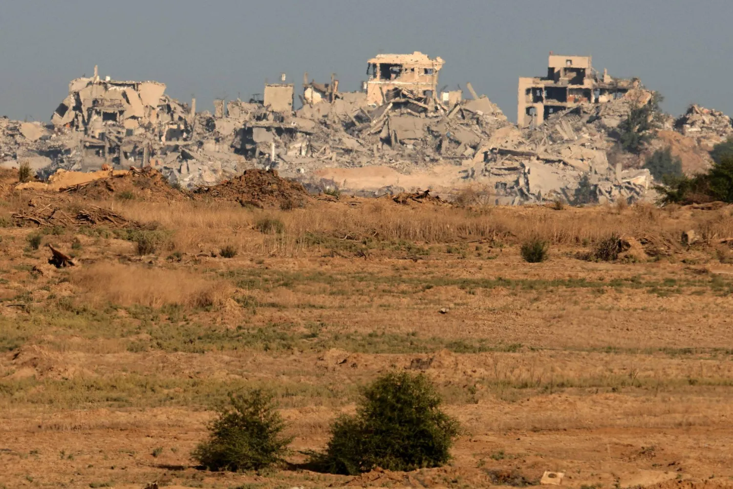 A picture taken from an undisclosed position in southern Israel along the border with the Gaza Strip shows the destruction in the besieged Palestinian territory on October 21, 2025. (AFP)