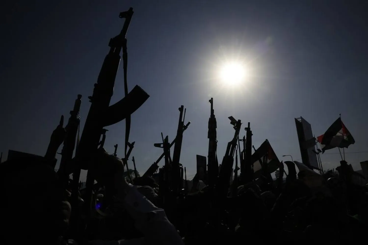 Houthi supporters hold up their weapons during a protest rally against Israel, in Sanaa, Yemen, 17 October 2025. (EPA)