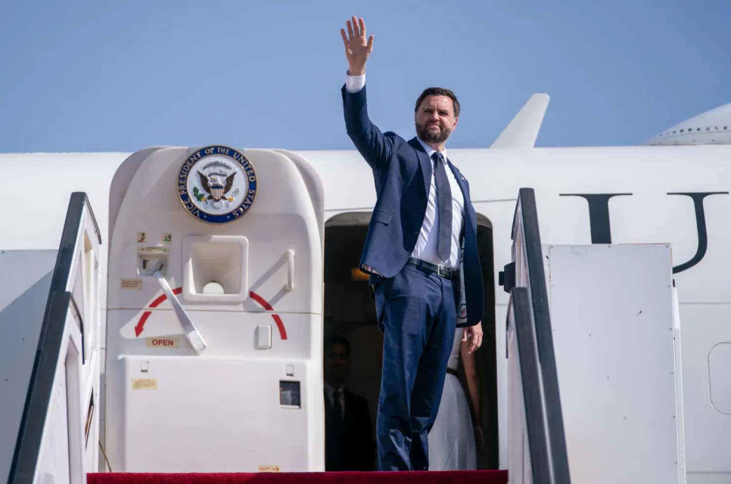 US Vice President J.D. Vance boards Air Force Two en route to Washington, D.C., at Ben Gurion Airport in Tel Aviv, Israel, Thursday, Oct. 23, 2025. (Nathan Howard/Pool Photo via AP)