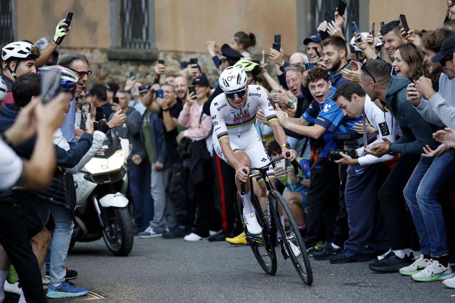 Reigning World Champion Tadej Pogacar pedals on his way to win Il Lombardia, Tour of Lombardy cycling race, in Bergamo, Italy, Saturday, Oct. 11, 2025. (Luca Bettini, LaPresse Pool via AP)