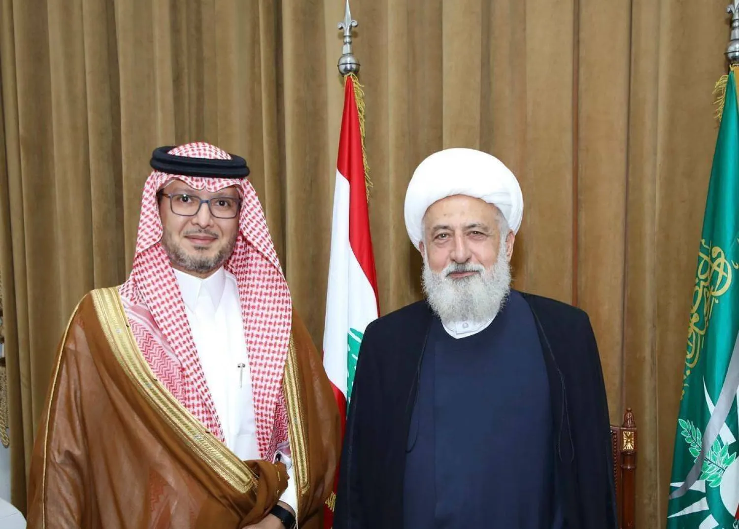 Saudi Ambassador to Lebanon Waleed Bukhari and head of the country’s Higher Islamic Shiite Council Sheikh Al-Khatib meet on Thursday. (Asharq Al-Awsat