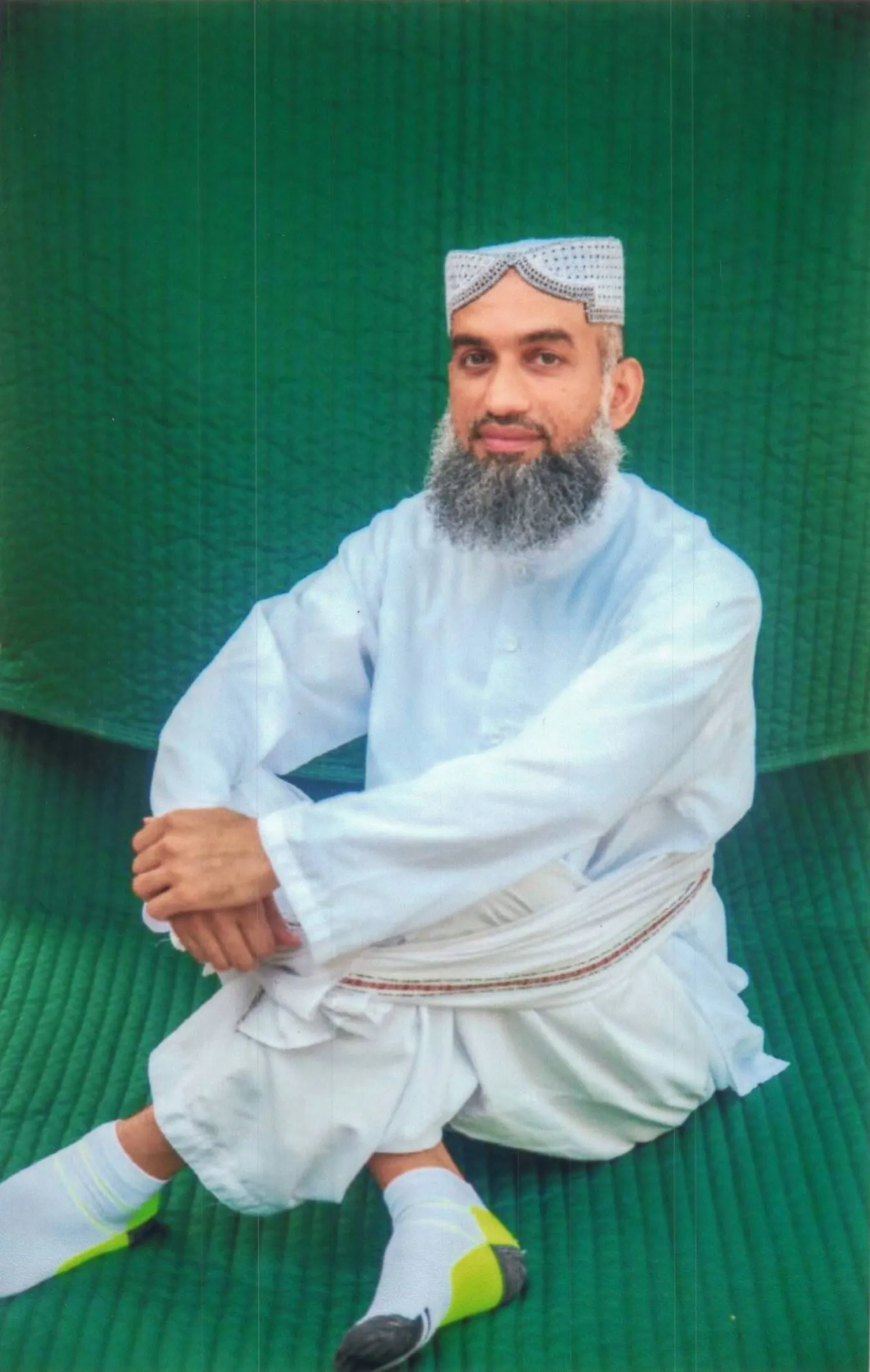 عمار البلوشي في صورة تعود إلى عام 2022 (فريقه القانوني من خلال صحيفة نيويورك تايمز)