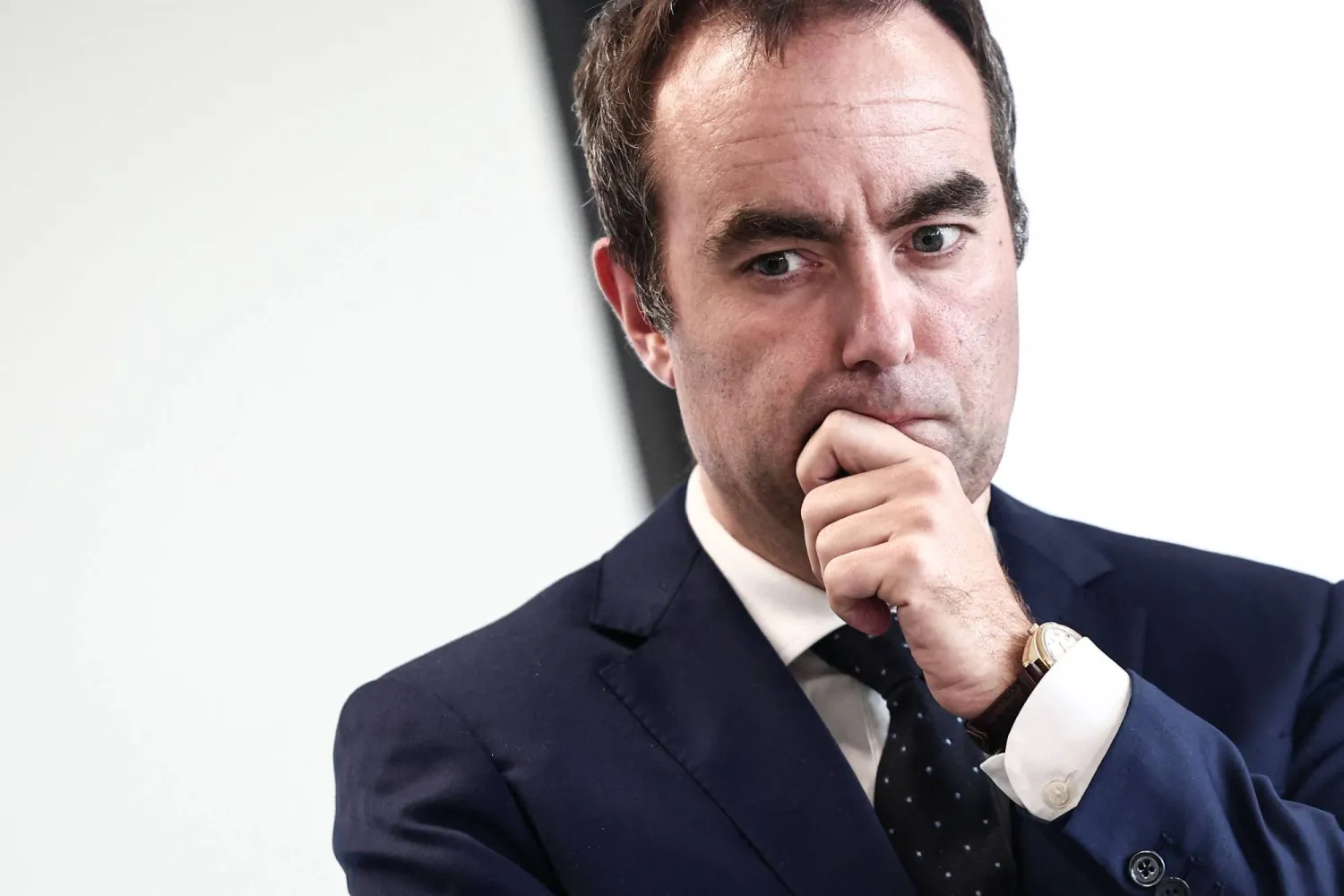 France's Prime Minister Sebastien Lecornu reacts during a visit at the National Tax Investigation Directorate (DNEF) and the National and International Audit Directorate (DVNI), in Romainville, in the outskirts of Paris, on October 23, 2025. (AFP)