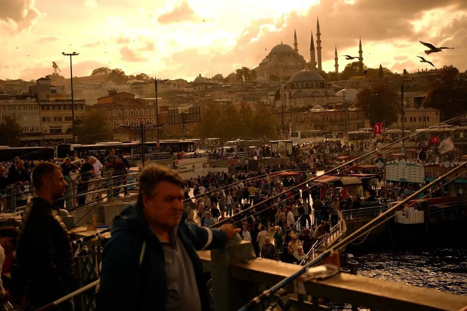 People stroll through Eminonu, a bustling commercial district by the Golden Horn in Istanbul, Türkiye, Saturday, Sept. 27, 2025. (AP) 