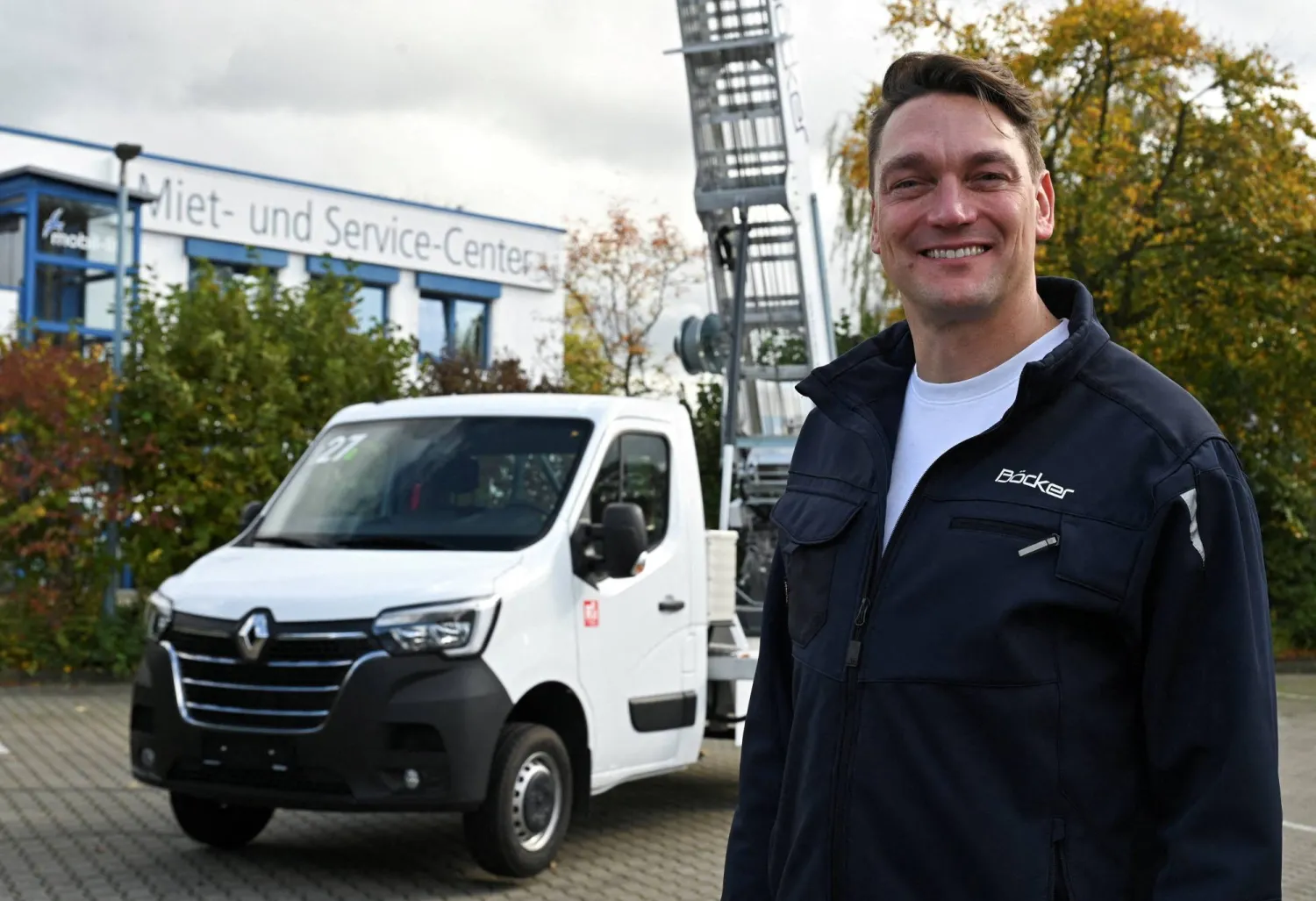 Alexander Böcker, CEO of German crane manufacturer Böcker Maschinenwerke GmbH, poses in front of a crane similar to the one that was used for the Louvre jewellery heist, in Werne, Germany October 23, 2025. (Reuters) 