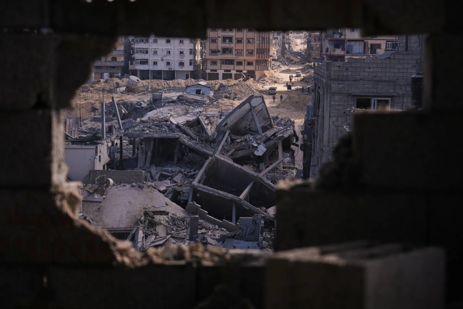  Buildings destroyed during the Israeli air and ground offensive are seen in the Al-Shati camp, in Gaza City, Friday, Oct. 24, 2025. (AP)