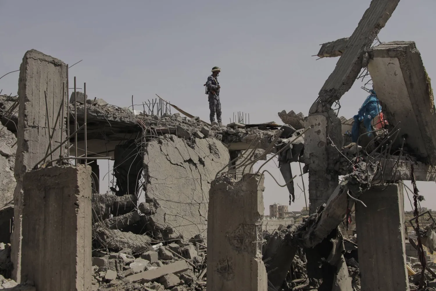Damage is seen after an American strike on a Houthi building in Sanaa. (AP)