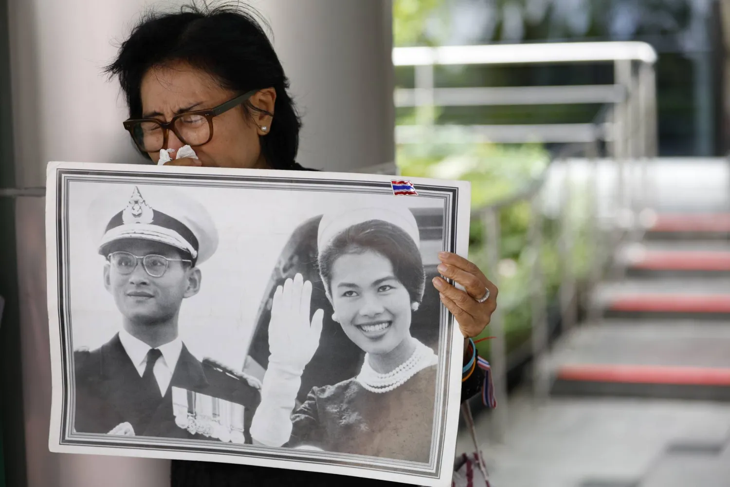 A Thai woman mourns Queen Mother Sirikit after the announcement of her death at King Chulalongkorn Memorial Hospital in Bangkok, Thailand, 25 October 2025. EPA/RUNGROJ YONGRIT