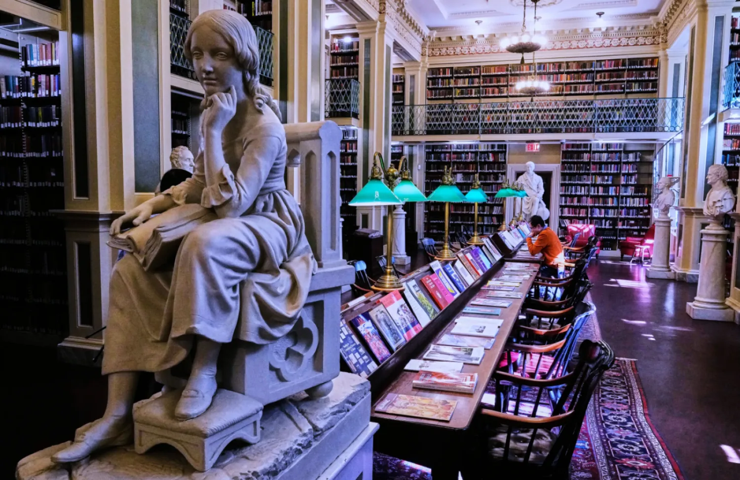 Little Nell, left, a sculpture of the character from Charles Dickens's "The Old Curiosity Shop", is displayed at the Boston Athenaeum, Thursday, Oct. 9, 2025, in Boston. (AP Photo/Charles Krupa)