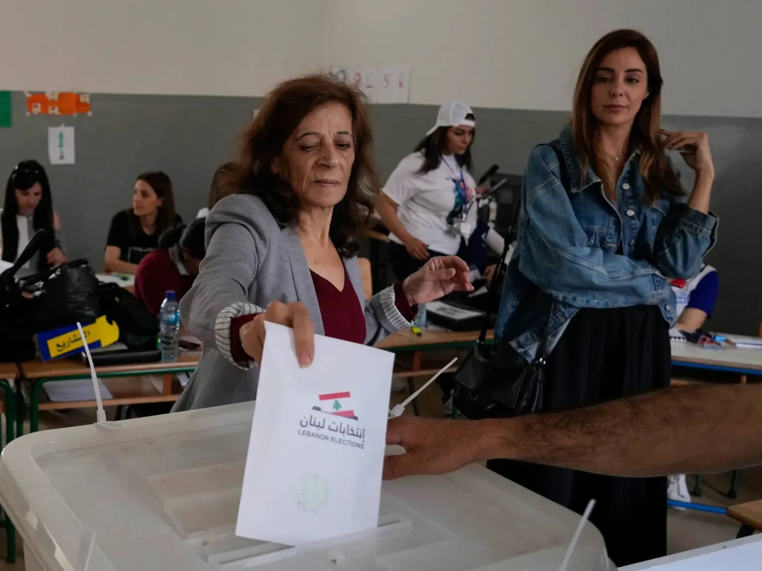 A woman votes during the 2022 parliamentary elections in Tripoli, Lebanon. (AP)