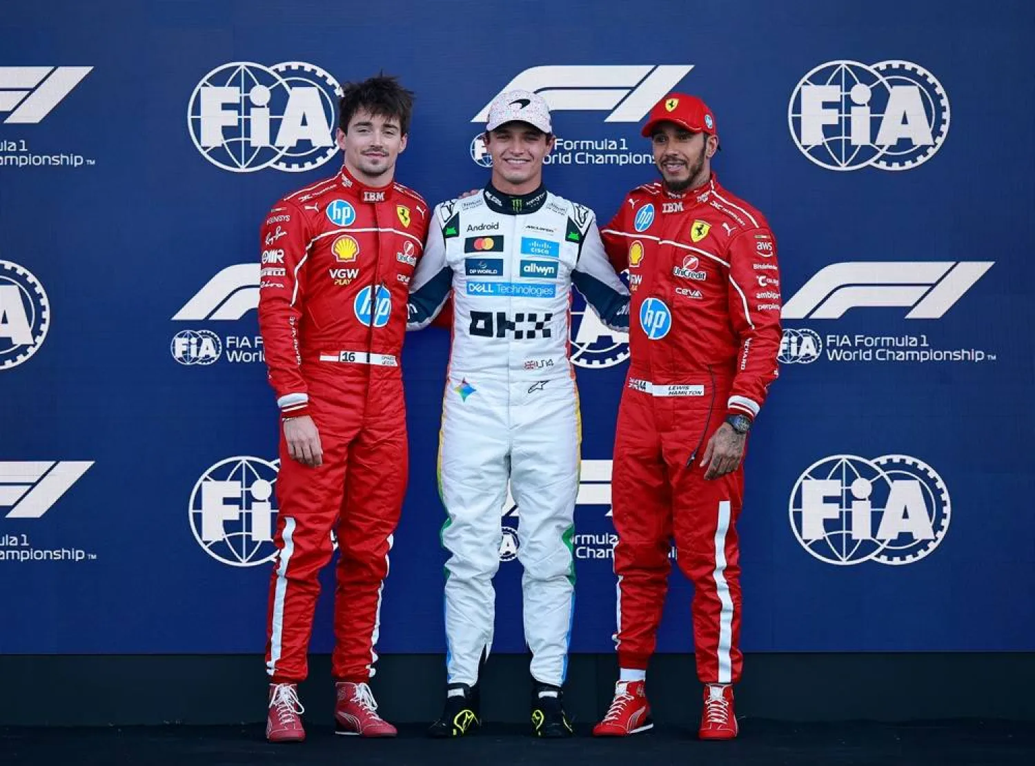 Formula One F1 - Mexico Grand Prix - Autodromo Hermanos Rodriguez, Mexico City, Mexico - October 25, 2025 McLaren's Lando Norris poses for a picture after qualifying in pole position with second placed Ferrari's Charles Leclerc and third placed Ferrari's Lewis Hamilton. (Reuters) 