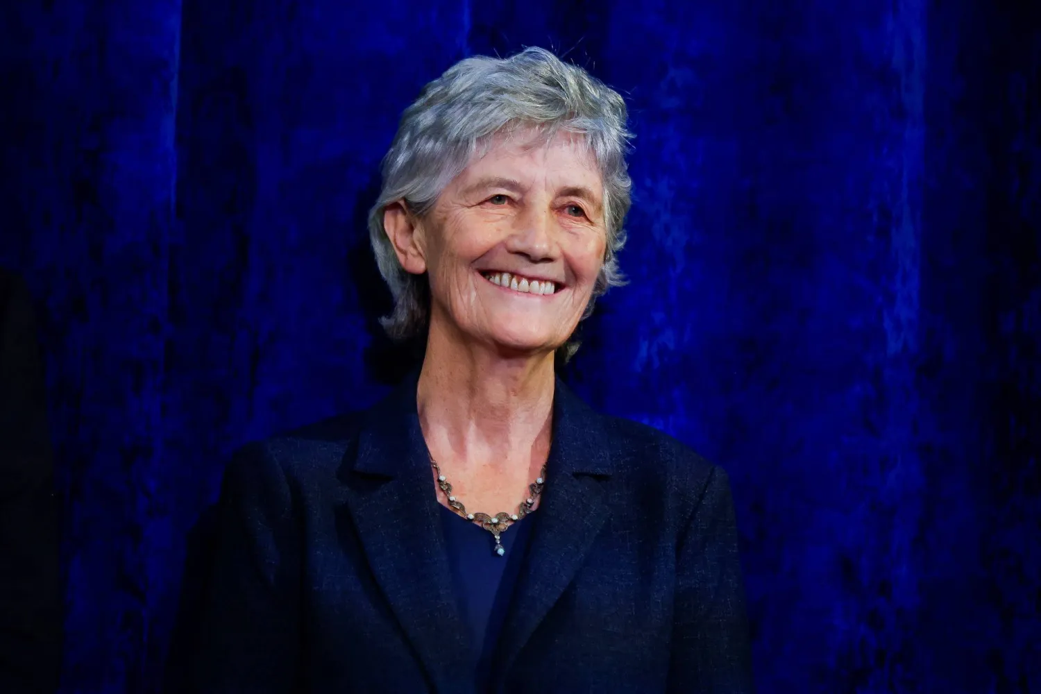  President-elect Catherine Connolly reacts as she stands on a stage at Dublin Castle, on the day of the announcement of the results of the Irish presidential election in Dublin, Ireland, October 25, 2025. (Reuters)