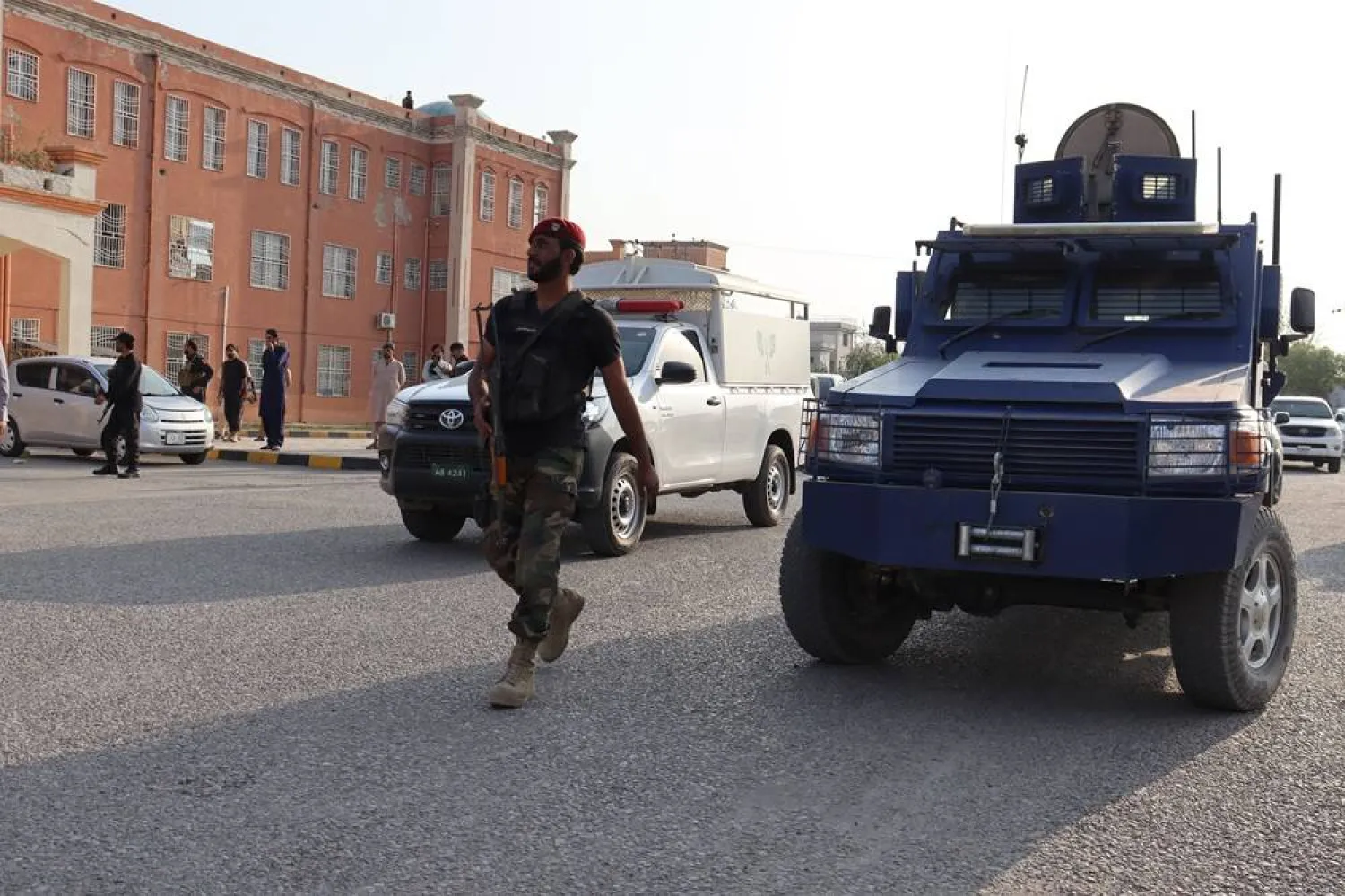 Pakistani security officials stand guard outside a hospital where injured victims of an explosion are treated in Hangu, KPK, Pakistan, 24 October 2025. (EPA)