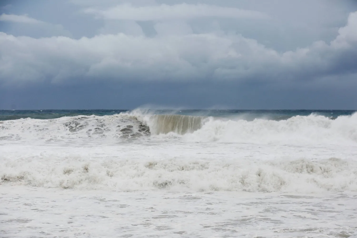 Waves crash on the beach, ahead of the arrival of Hurricane Melissa, in Port Royal, Jamaica, October 26, 2025. (Reuters)