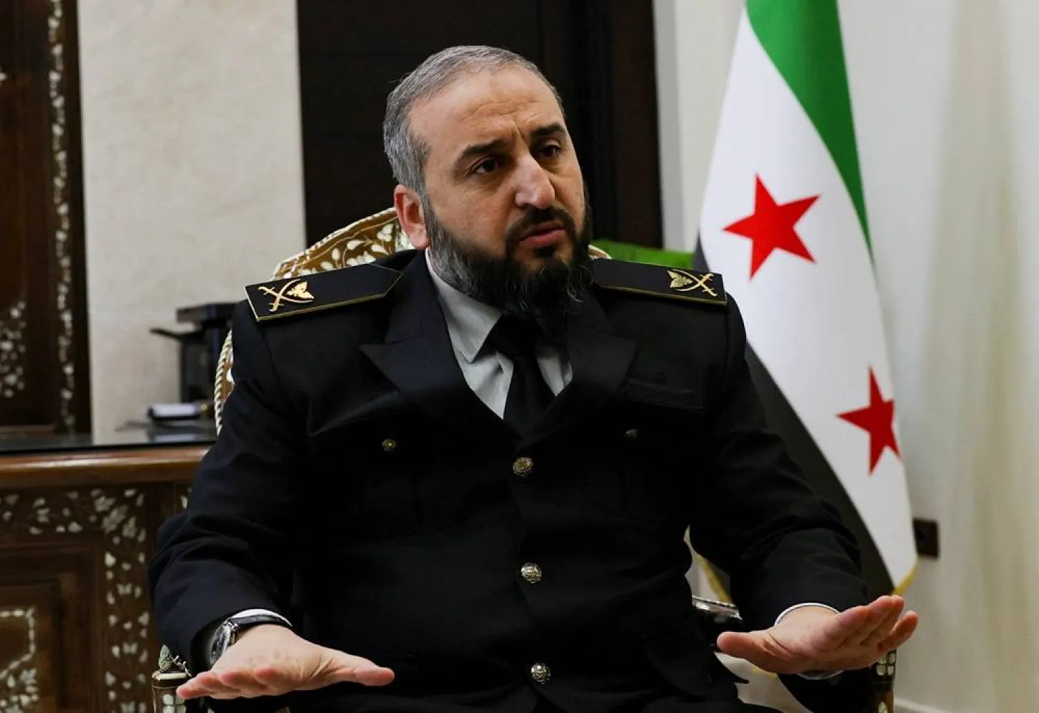 Syria's new Defense Minister Murhaf Abu Qasra attends an interview with Reuters in Damascus, Syria January 19, 2025. (Reuters)