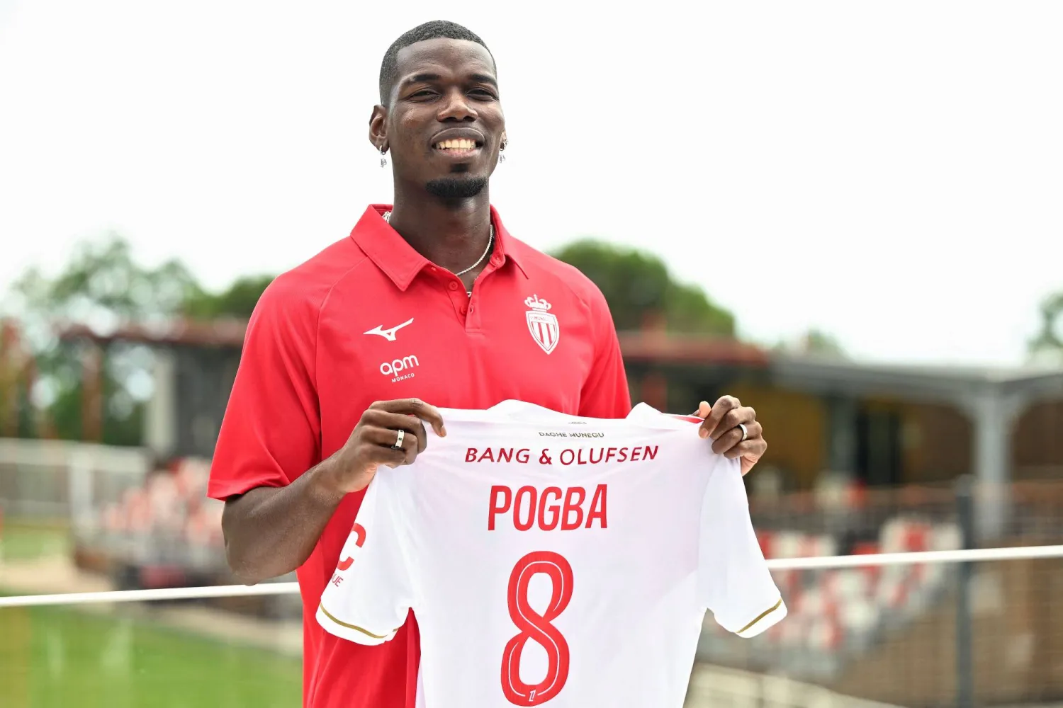 French midfielder Paul Pogba poses with his new jersey following his official presentation in Monaco, on July 3, 2025. (AFP)