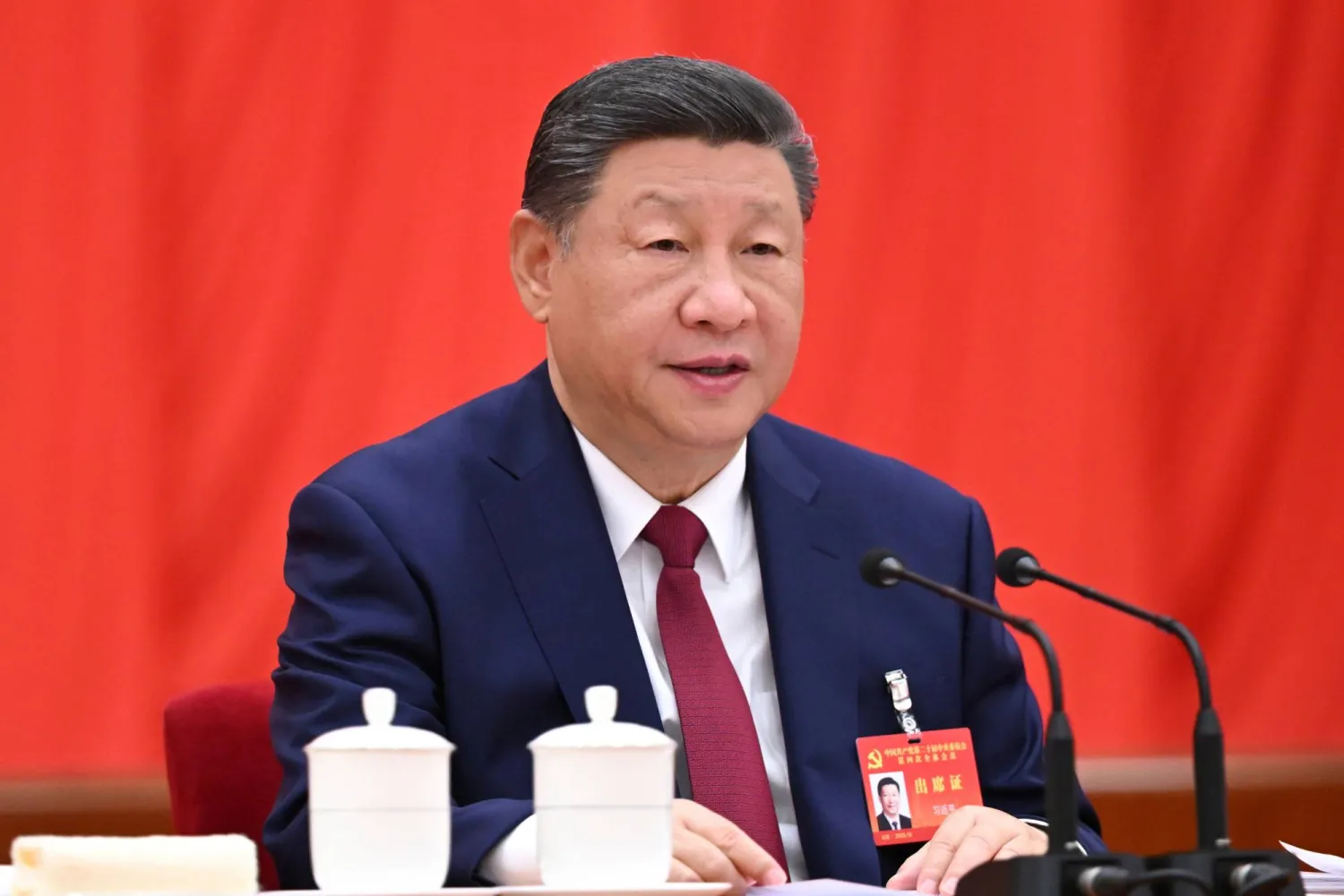 In this photo released by Xinhua News Agency on Thursday, Oct 23, 2025, Chinese President Xi Jinping speaks during the fourth plenary session of the 20th Communist Party of China (CPC) Central Committee in Beijing. (Xie Huanchi/Xinhua via AP)
