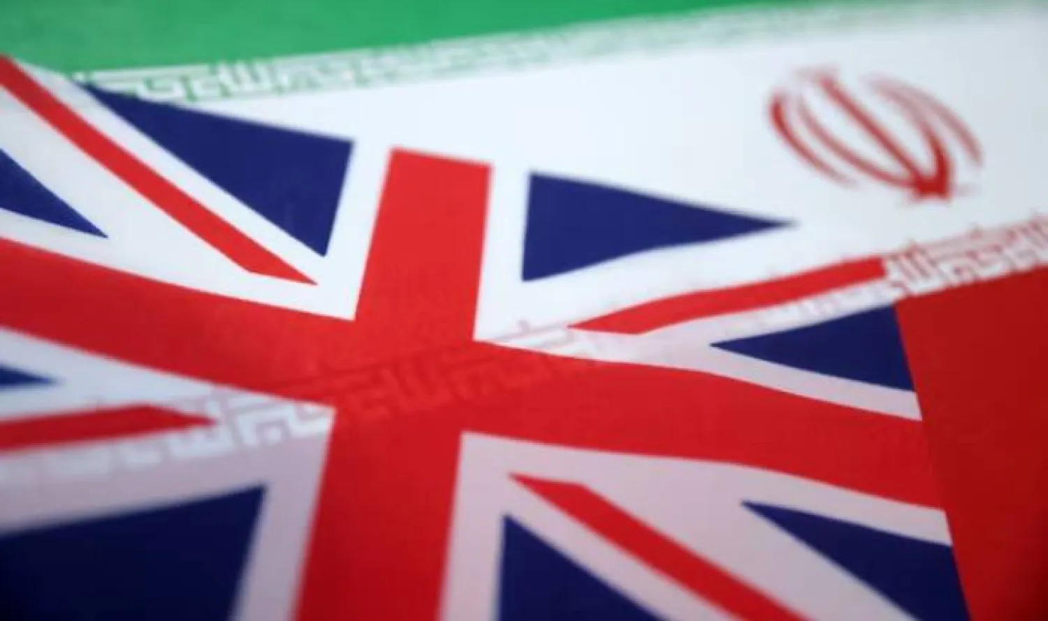UK and Iran flags are seen in this illustration taken June 18, 2025. REUTERS/Dado  