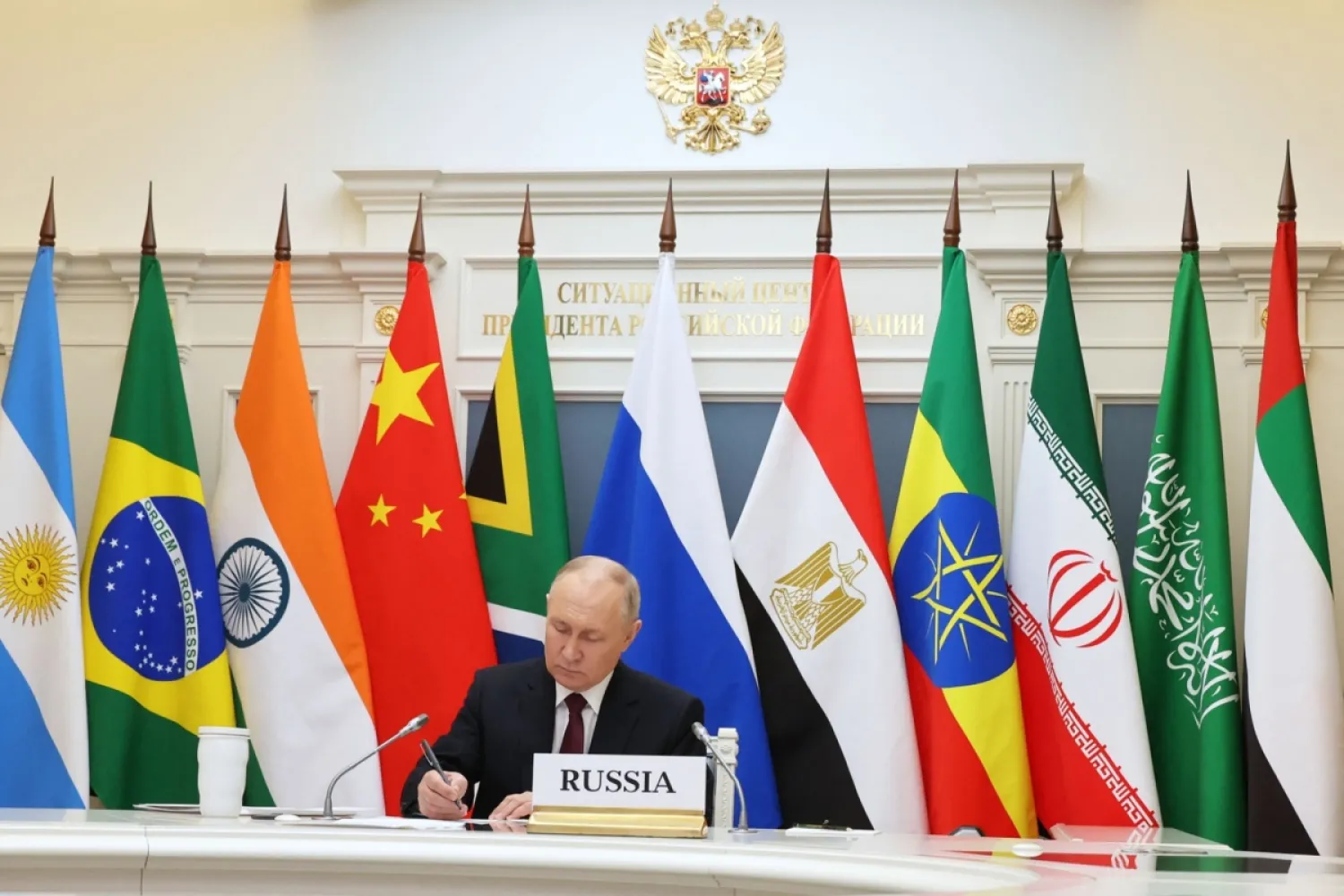 Rusya Devlet Başkanı Vladimir Putin, Moskova'da Rusya, Hindistan, Çin ve Güney Afrika'dan oluşan BRICS ülkelerinin zirveye telekonferans yöntemiyle katıldığı sırada, 21 Kasım 2023 (AFP)