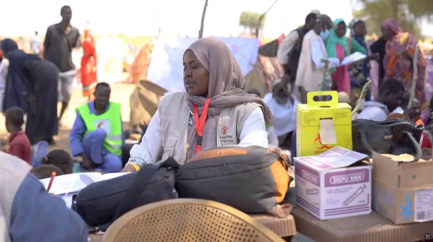 A medic waits in a makeshift clinic as displaced Sudanese gather after fleeing Al-Fashir city in Darfur, in Tawila, Sudan, October 29, 2025, in this still image taken from a Reuters' video. REUTERS/Mohamed Jamal
