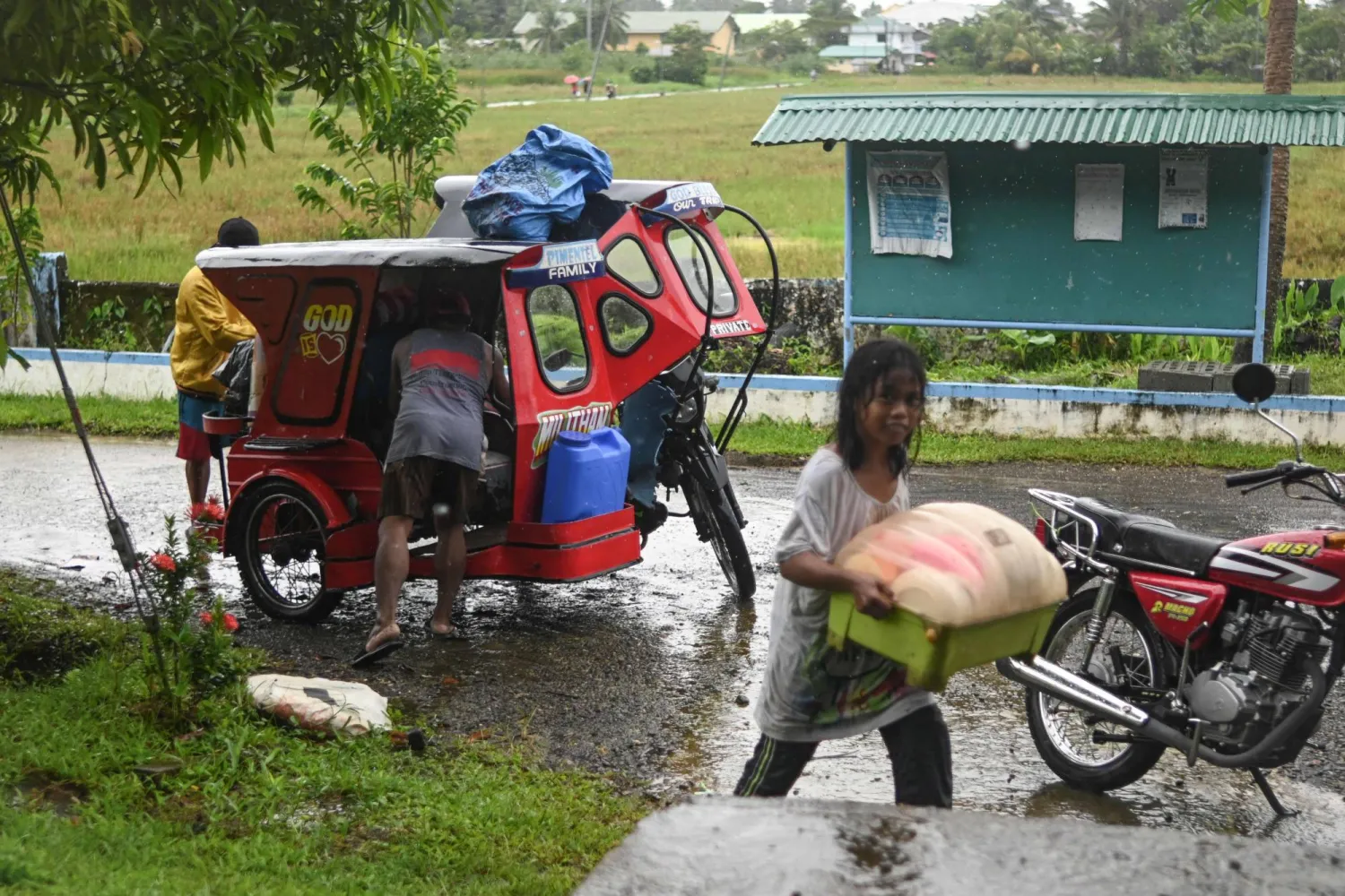 People take shelter at a school as they evacuate in Balangkayan in Eastern Samar on November 3, 2025, ahead of the landfall of Typhoon Kalmaegi. (AFP) 