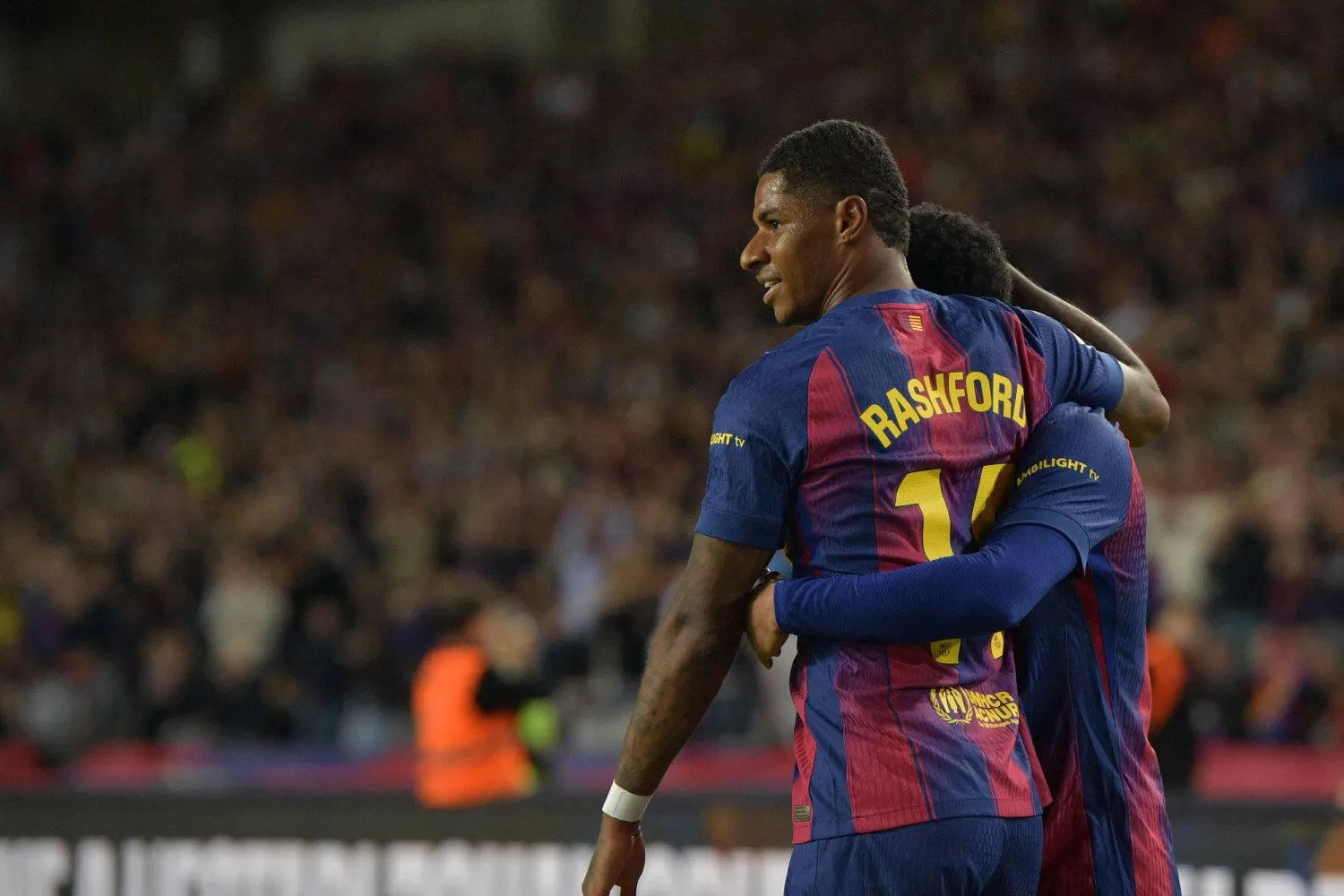 Barcelona's English forward #14 Marcus Rashford celebrates scoring his team's third goal during the Spanish league football match between FC Barcelona and Elche CF at Estadi Olimpic Lluis Companys in Barcelona on November 2, 2025. (AFP) 