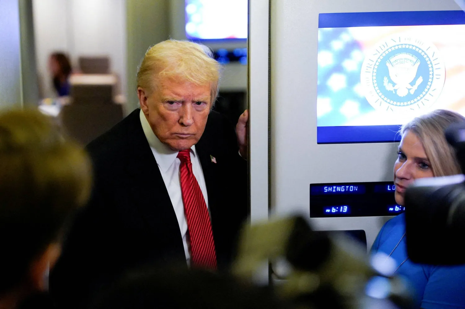 US President Donald Trump looks on as he speaks to members of the media on board Air Force One en route to Joint Base Andrews, US, November 2, 2025. (Reuters) 