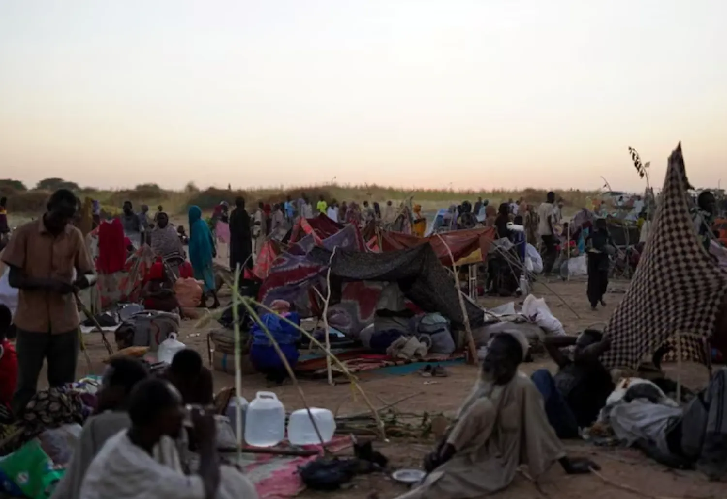 A general view of people sitting at a camp for displaced families who fled from al-Fashir to Tawila, North Darfur, Sudan, October 27, 2025. REUTERS/Mohammed Jamal 