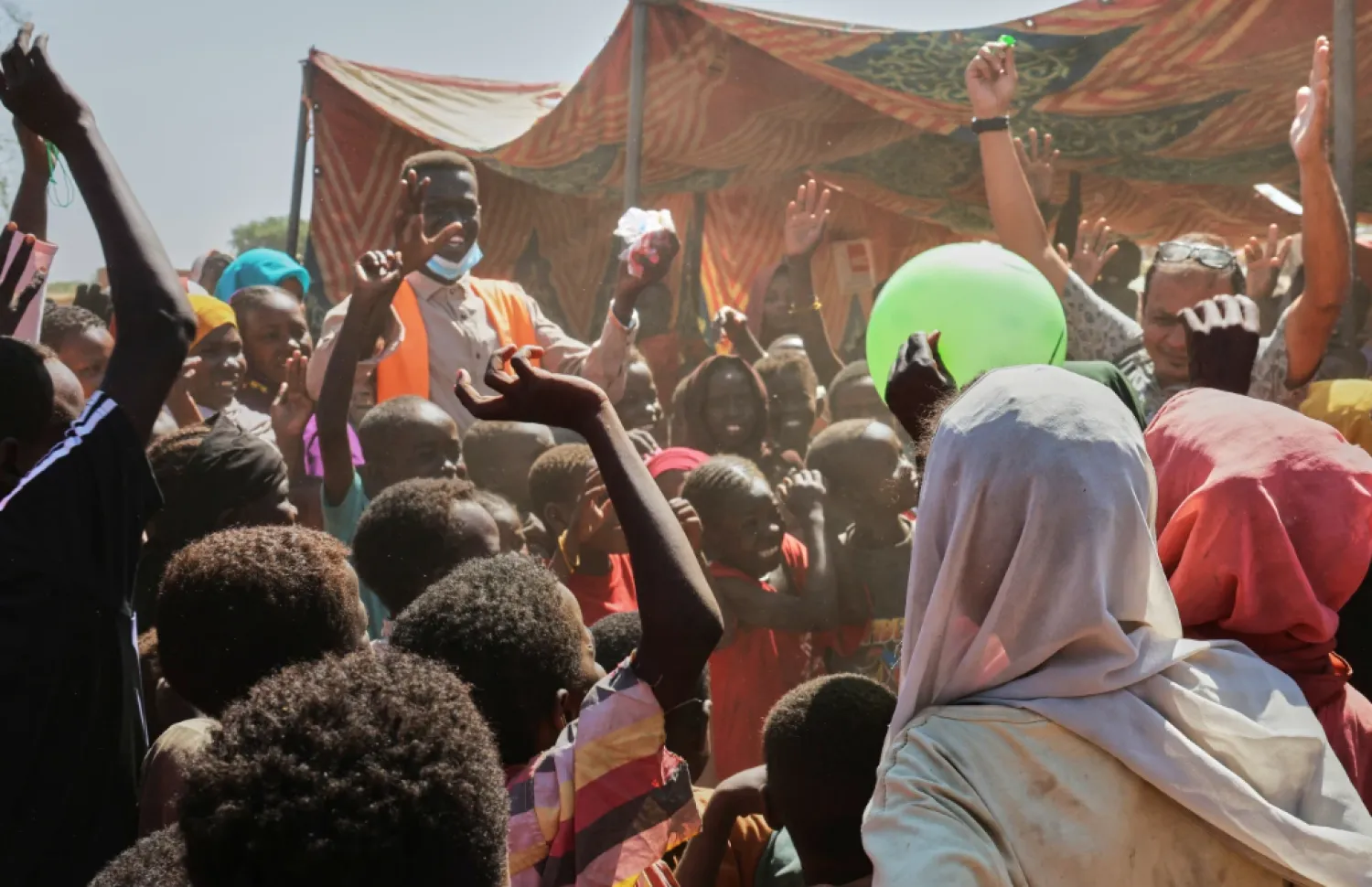 This photo released by The Norwegian Refugee Council (NRC), shows displaced children from el-Fasher playing at a camp where they sought refuge from fighting between government forces and the RSF, in Tawila, Darfur region, Sudan, Monday, Nov. 3, 2025. (Marwan Mohammed/NRC via AP)
