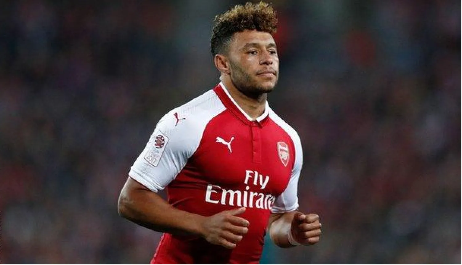 أليكس أوكسليد-تشامبرلين لاعب آرسنال السابق (بي بي سي)