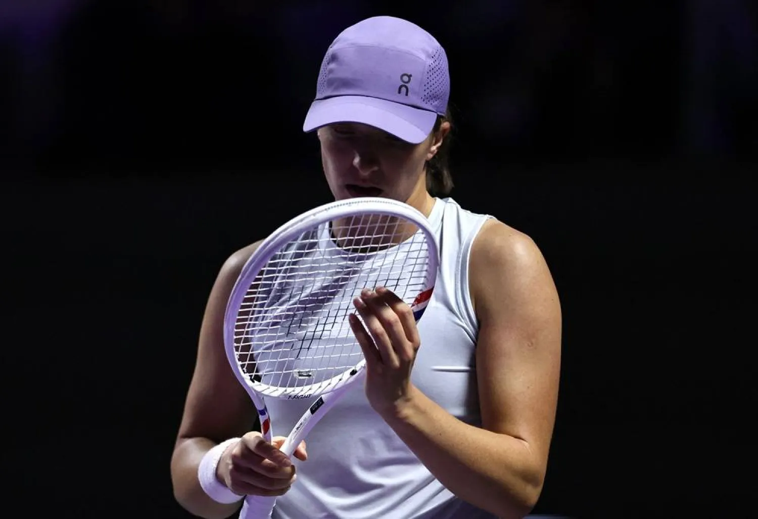  Tennis - WTA Finals - Riyadh - King Saud University Indoor Arena, Riyadh, Saudi Arabia - November 3, 2025 Poland's Iga Swiatek reacts during her group stage match against Kazakhstan's Elena Rybakina. (Reuters)