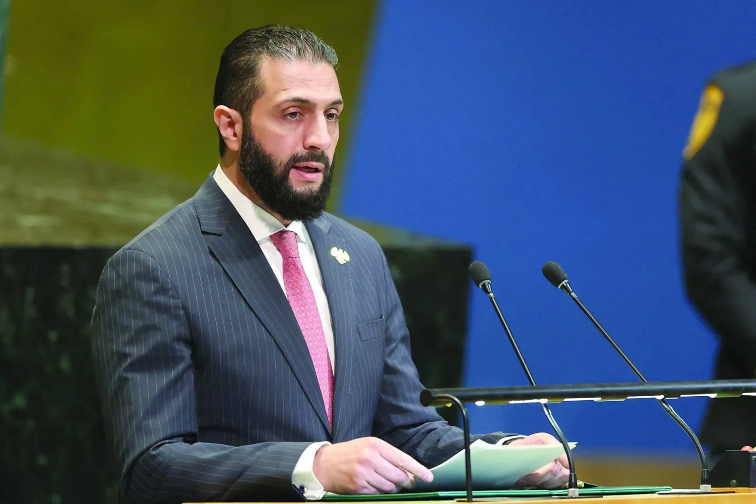 Syrian President Ahmed al-Sharaa speaks during the General Debate of the United Nations General Assembly at the UN headquarters in New York City on September 24, 2025. (Photo by ANGELA WEISS / AFP)