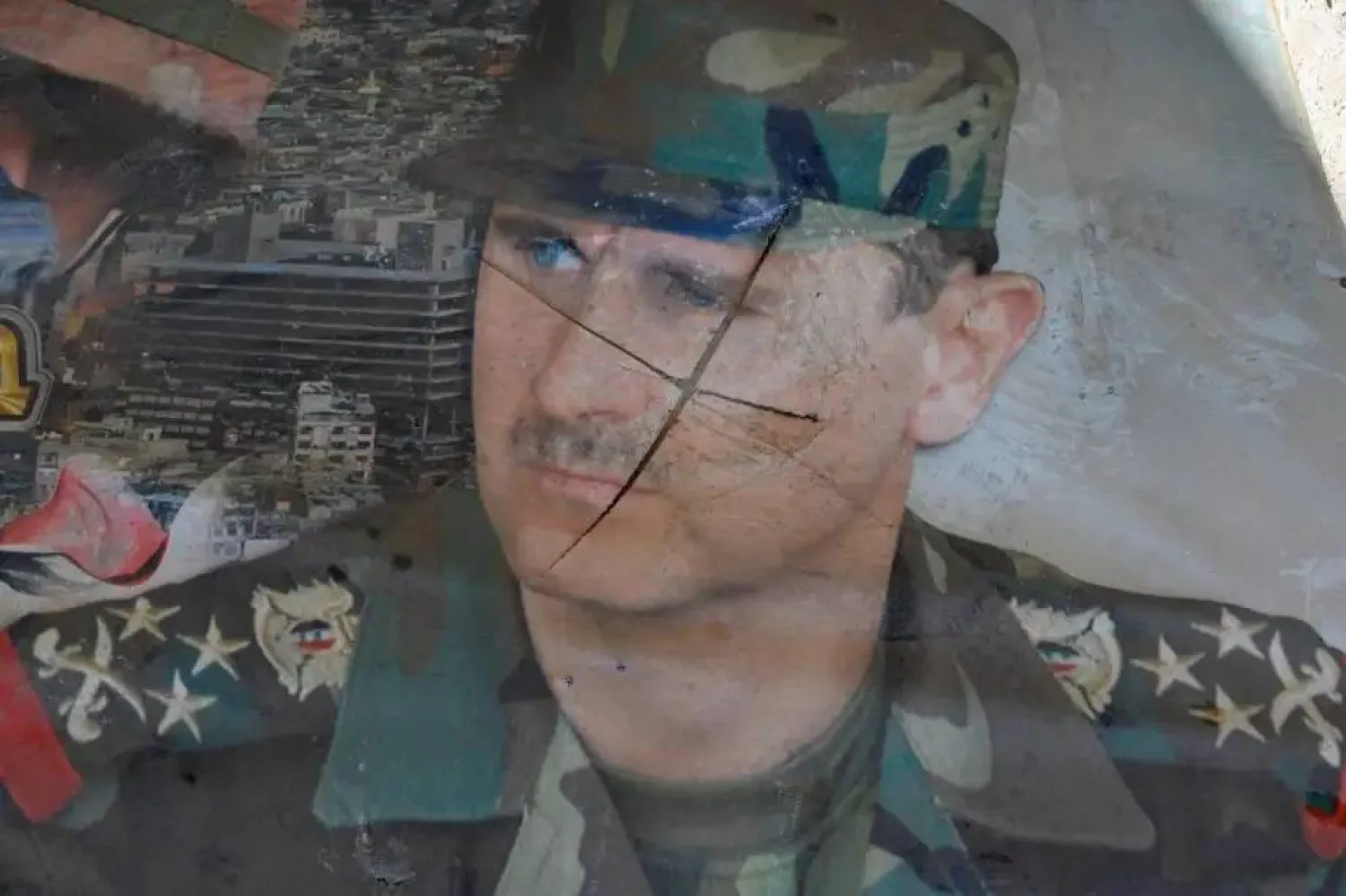 A portrait of the president is defaced at Syria’s Palestine Branch prison, where piles of documents of interrogations and reports, and its dark, dank collection of cells, shows the systematic cruelty of the toppled regime of Bashar al-Assad, in Damascus, Syria on December 17, 2024. (Getty Images) 