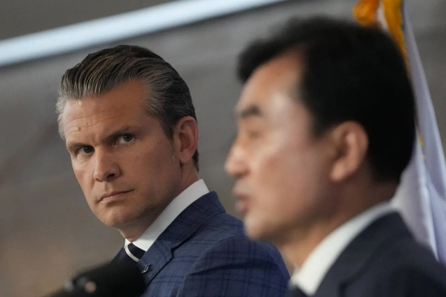 US Defense Secretary Pete Hegseth (L) listens as South Korean Defense Minister Ahn Gyu-back (R) speaks during a joint press conference following the 57th Security Consultative Meeting (SCM) at the Defense Ministry in Seoul on November 4, 2025. (AFP)