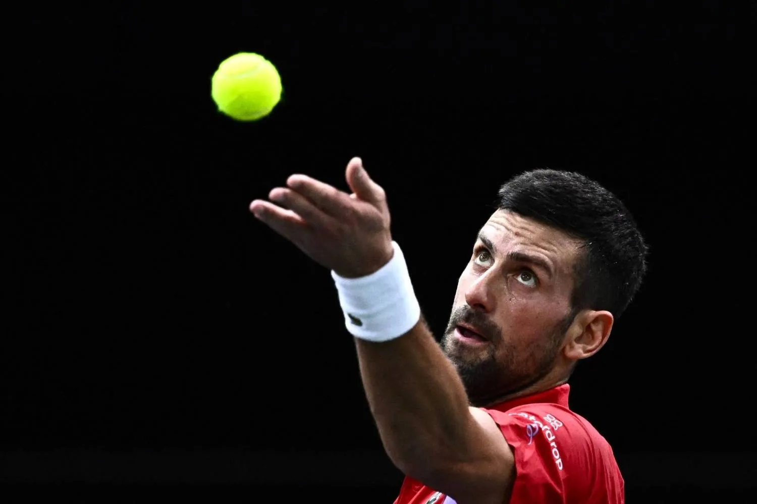 Novak Djokovic serves to Tomas Martin Etcheverry during their men's singles match on Day 3 of the Paris ATP Masters 1000 tennis tournament in Paris in November 2023. (AFP) 