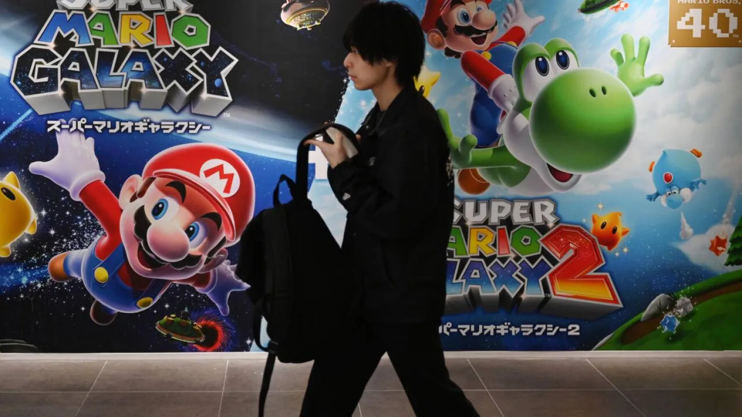 While Nintendo is diversifying into hit movies and theme parks, consoles remain at the core of its business. GREG BAKER / AFP
