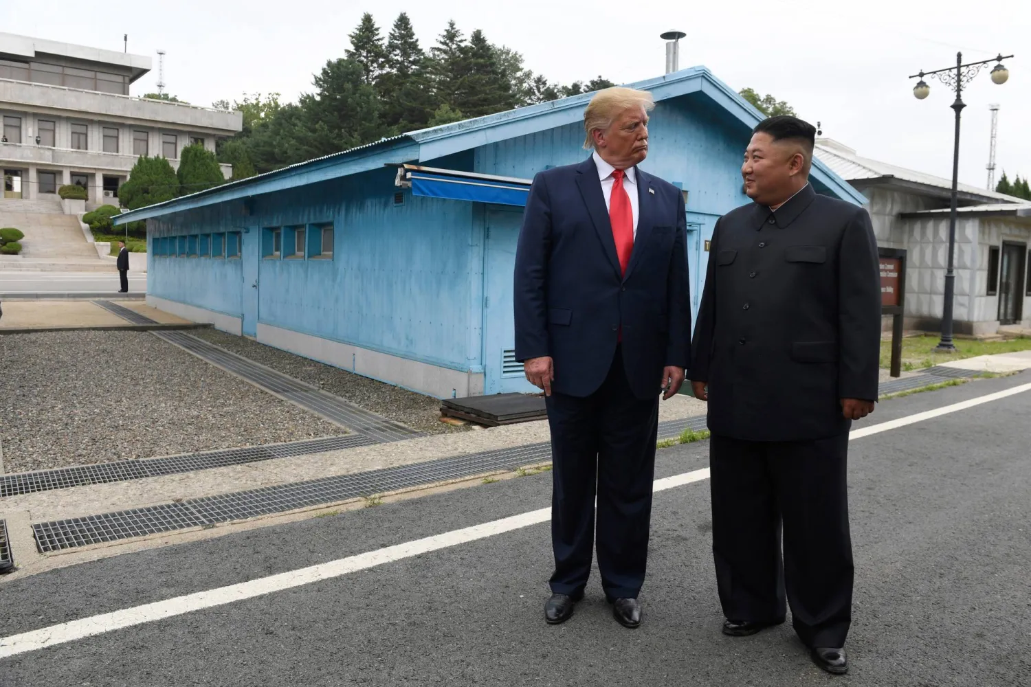 In this June 30, 2019, file photo, US President Donald Trump, left, meets with North Korean leader Kim Jong Un at the border village of Panmunjom in Demilitarized Zone, South Korea. (AP)