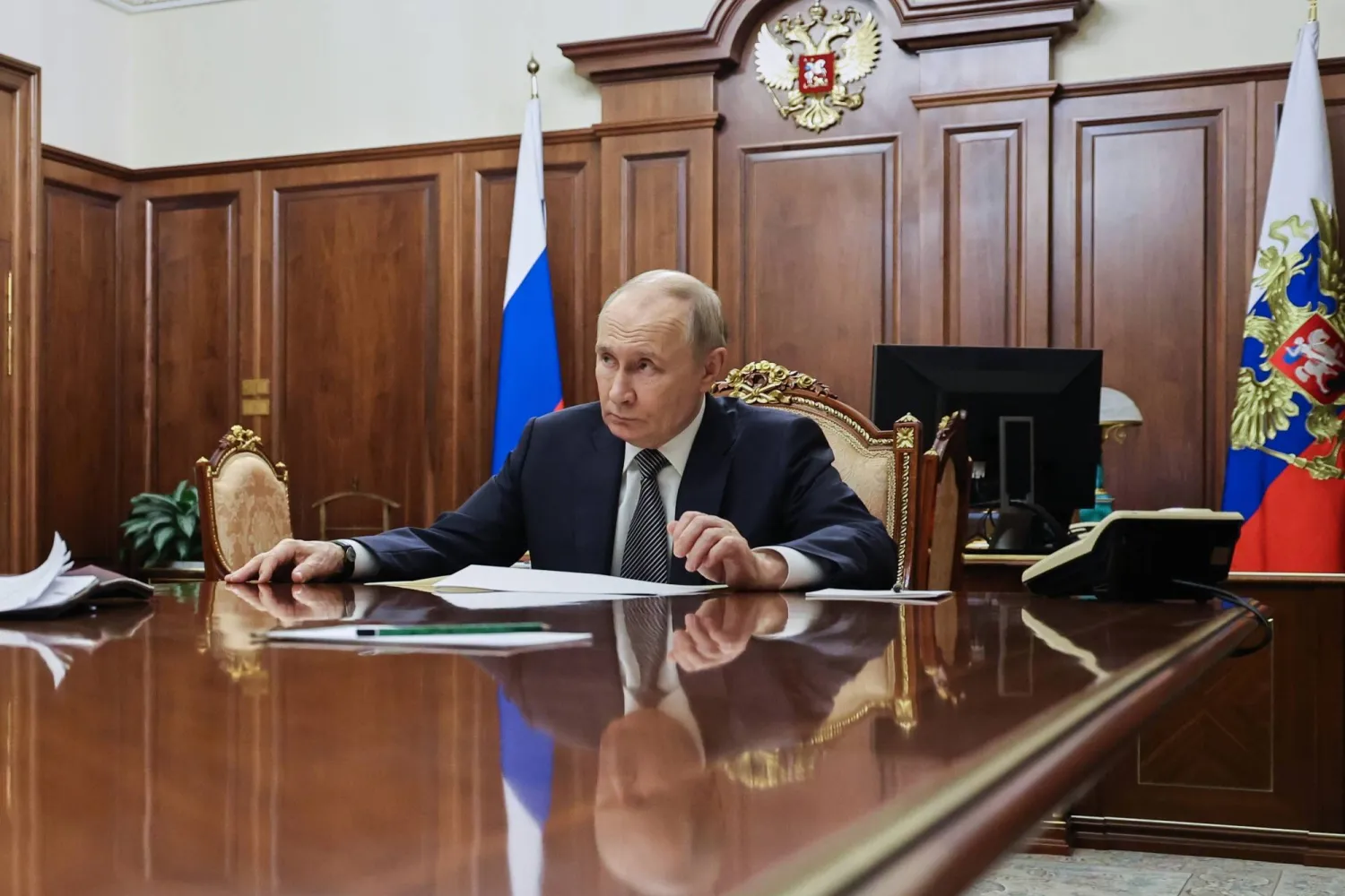Russian President Vladimir Putin listens to Presidential Aide, Special Presidential Representative for Climate Issues Ruslan Edelgeriyev during their meeting at the Kremlin, in Moscow, Russia, Saturday Nov. 1, 2025. (Alexander Kazakov, Sputnik, Kremlin Pool Photo via AP)