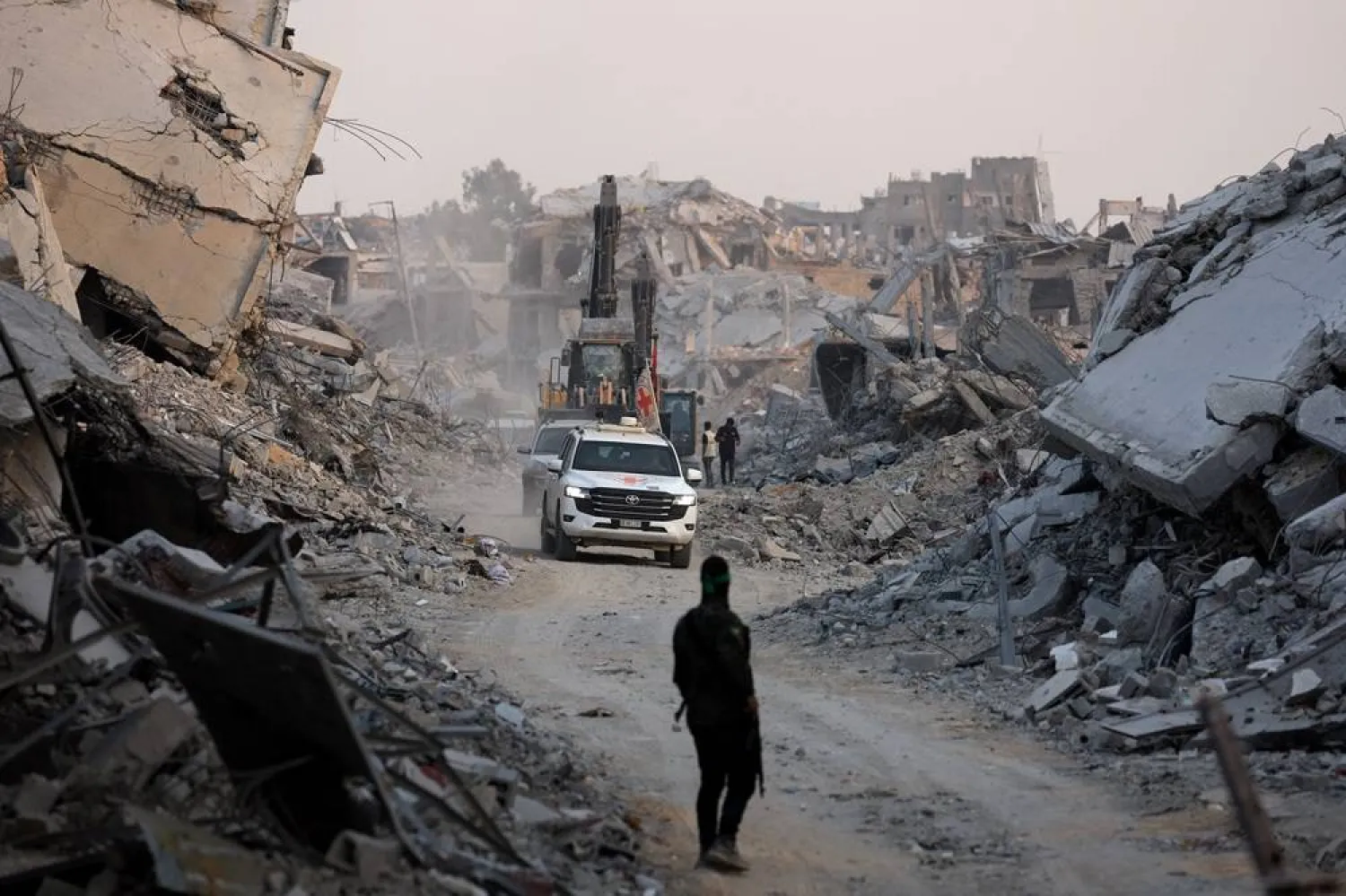  Red Cross vehicles drive, after Hamas said that it found the body of an Israeli hostage soldier on Tuesday and prepares to return it to Israel through the Red Cross, in Gaza City, November 4, 2025. (Reuters)