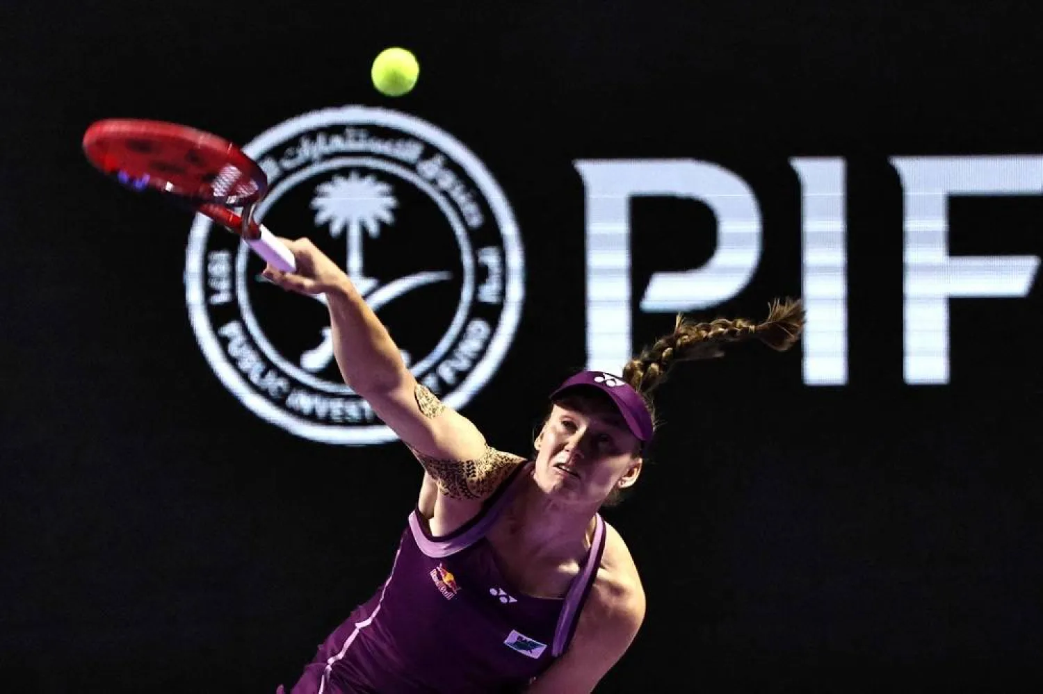 Kazakhstan's Elena Rybakina serves to Russia's Ekaterina Alexandrova during their WTA Finals tennis tournament in Riyadh on November 5, 2025. (AFP) 