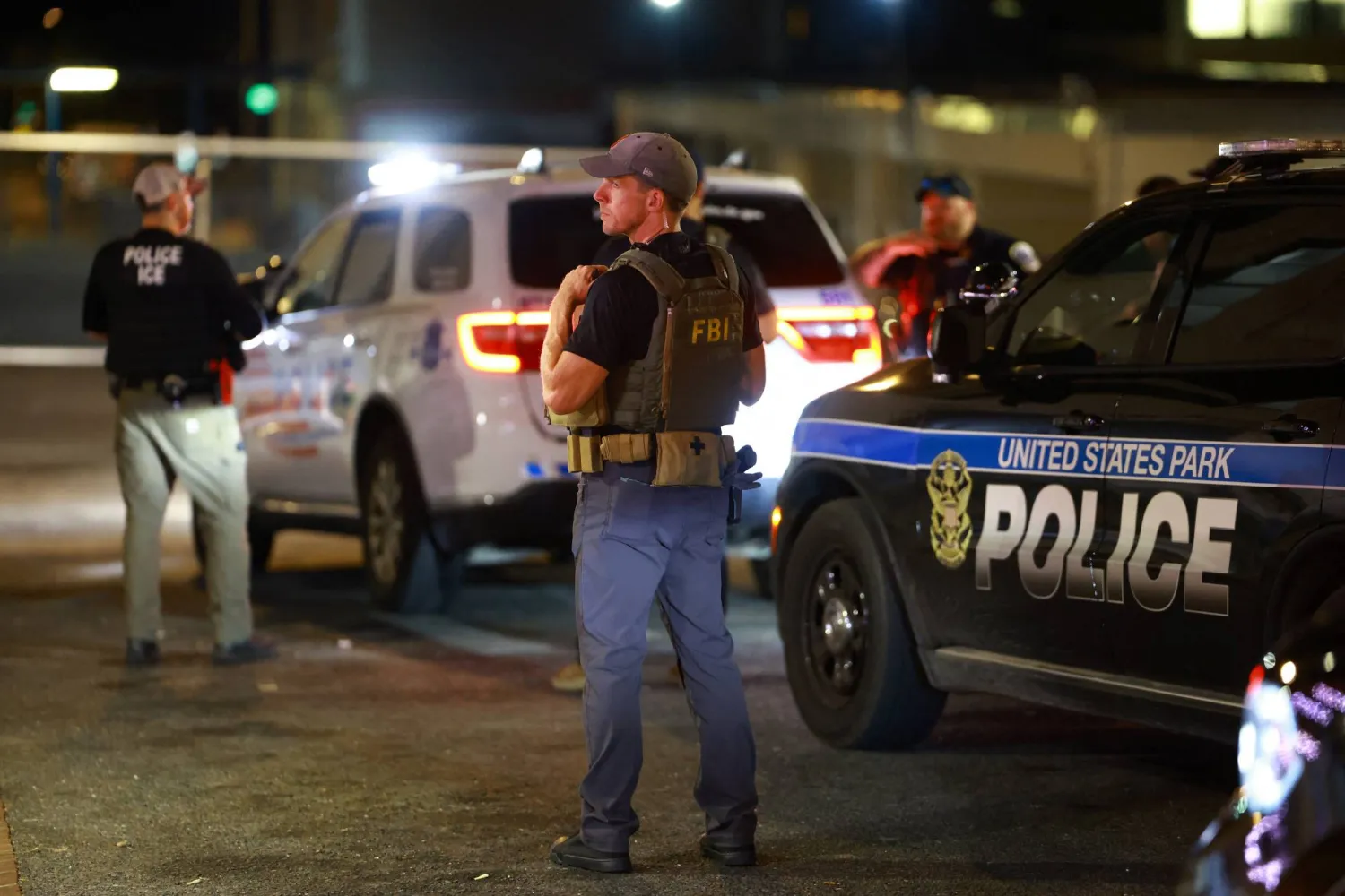 Police officers and federal agents patrol in the Kingman Park neighborhood, weeks after US President Donald Trump ordered National Guard and law enforcement to patrol the nation’s capital to assist in crime prevention, in Washington, D.C., US, August 26, 2025.  REUTERS/Jose Luis Gonzalez