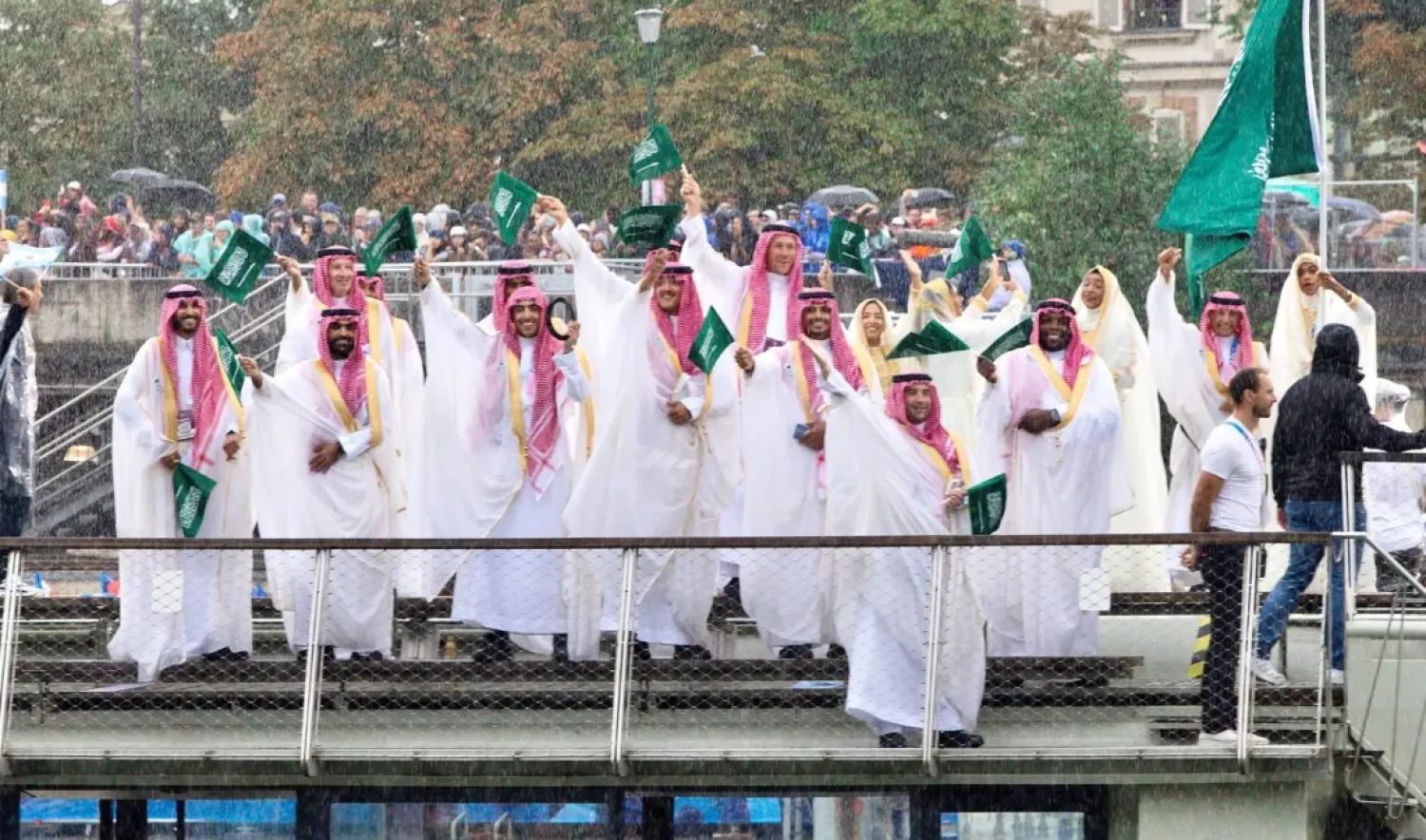 Saudi athletes raising their country’s flag at Paris Olympics - File Photo/SPA