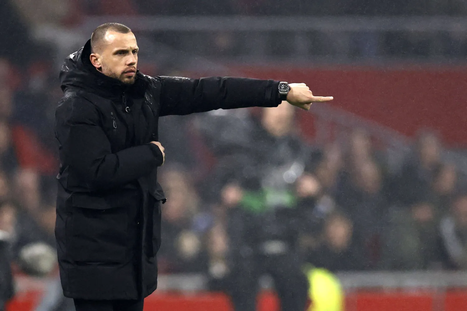 (FILES) Ajax' Dutch headcoach John Heitinga gestures during the UEFA Europa League first leg play off football match between Ajax Amsterdam (NED) and Union Berlin (GER) at the Johan Cruijff ArenA, in Amsterdam on February 16, 2023. (Photo by MAURICE VAN STEEN / ANP / AFP) 