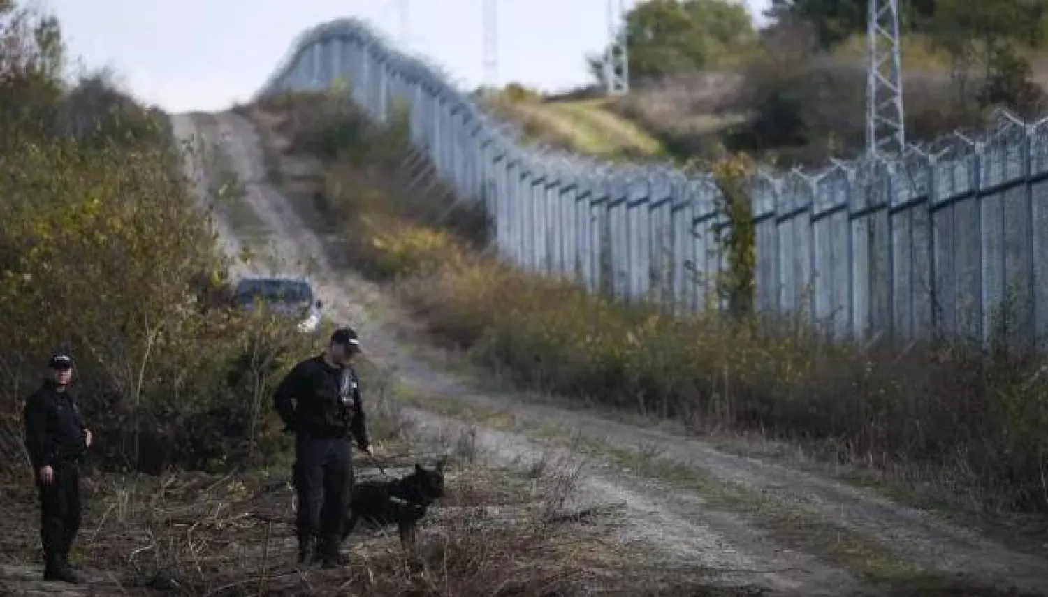 
Bulgarian police patrol the border fence on the Bulgaria-Türkiye border near the village of Matochina on November 4, 2021.  Nikolay Doychinov/AFP via Getty Images
