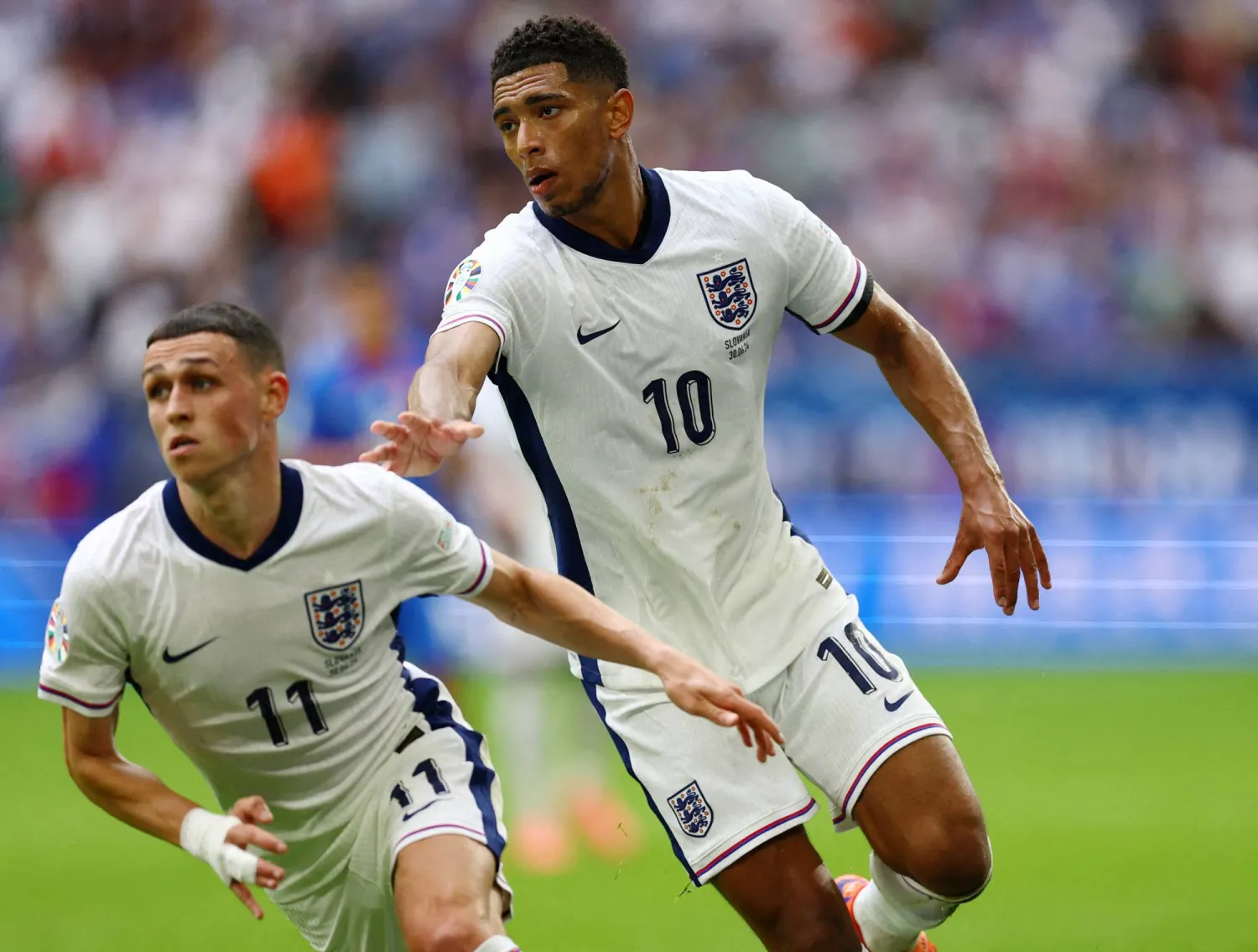 Football - Euro 2024 - Round of 16 - England v Slovakia - Arena AufSchalke, Gelsenkirchen, Germany - June 30, 2024 England's Phil Foden and Jude Bellingham in action. (Reuters)