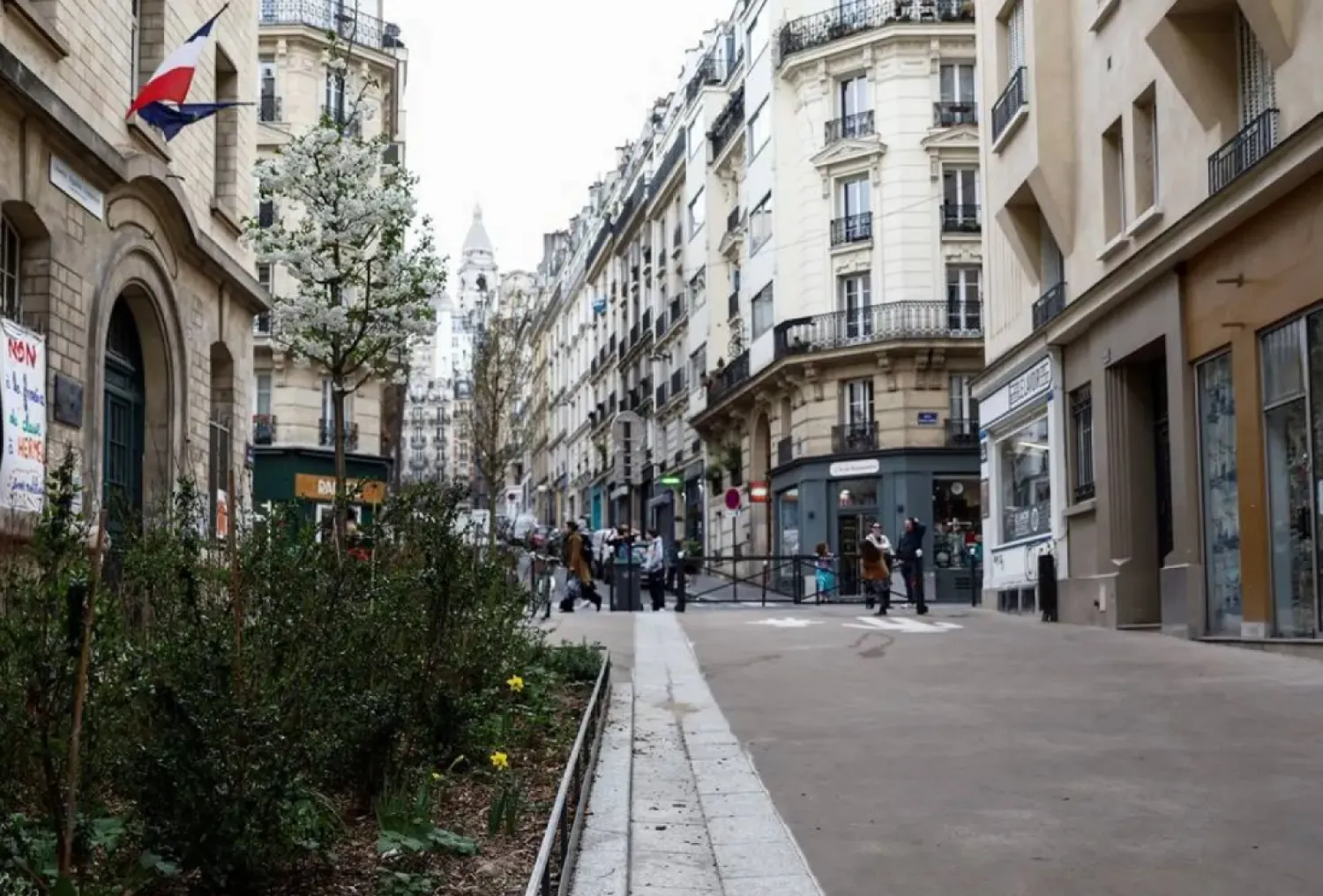 A view shows streets Rue Ferdinand Flocon, one of the pedestrianized streets, ahead of the March 23 citywide vote on a proposition from city hall to pedestrianize 500 streets, in Paris, France, March 21, 2025. (Reuters)
