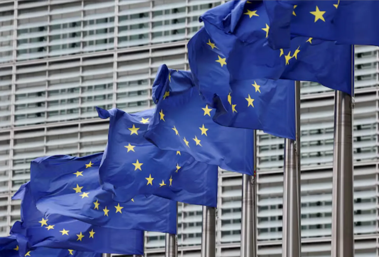 European Union flags flutter outside the EU Commission headquarters in Brussels, Belgium July 16, 2025. REUTERS/Yves Herman 