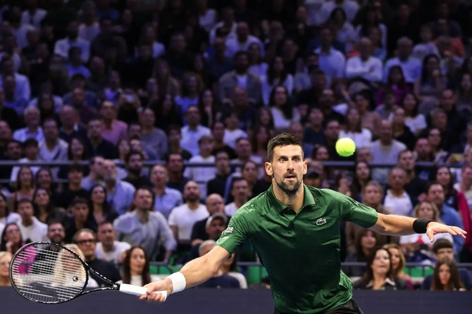 Novak Djokovic of Serbia in action against Lorenzo Musetti of Italy (not pictured) during the men's finals match of the ATP Hellenic Championship tennis tournament, Athens, Greece, 08 November 2025. (EPA)