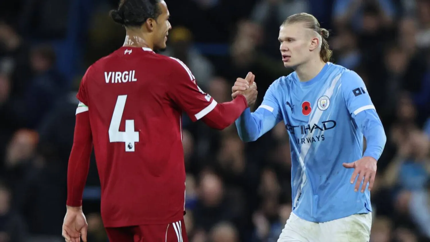 Liverpool captain Virgil van Dijk said his side will not give up despite a 3-0 defeat to Manchester City. Darren Staples / AFP
