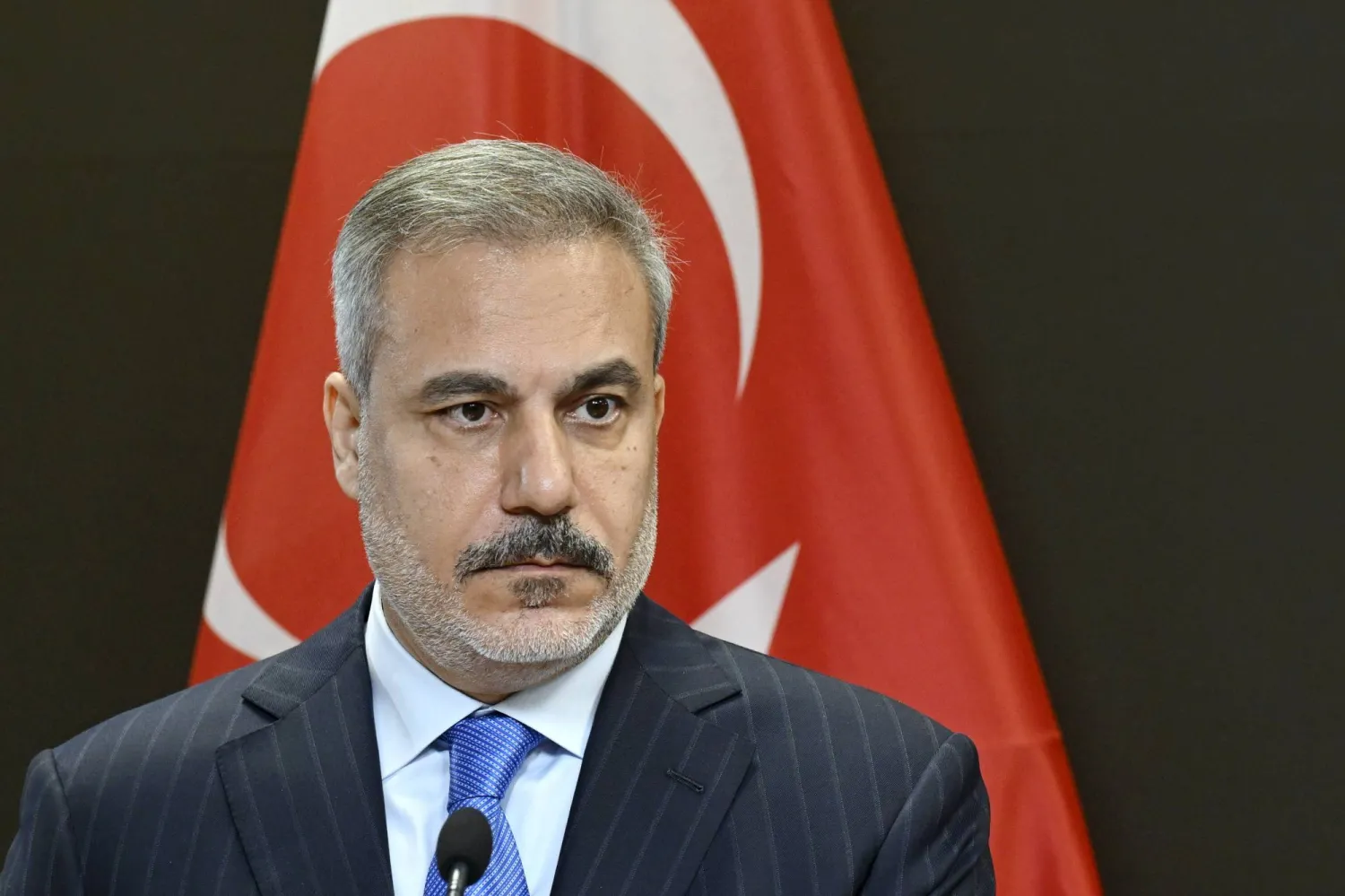 05 November 2025, Finland, Helsinki: Turkish Foreign Minister Hakan Fidan holds a joint press conference with Finnish Foreign Minister Elina Valtonen (not in picture) after their meeting. (dpa)